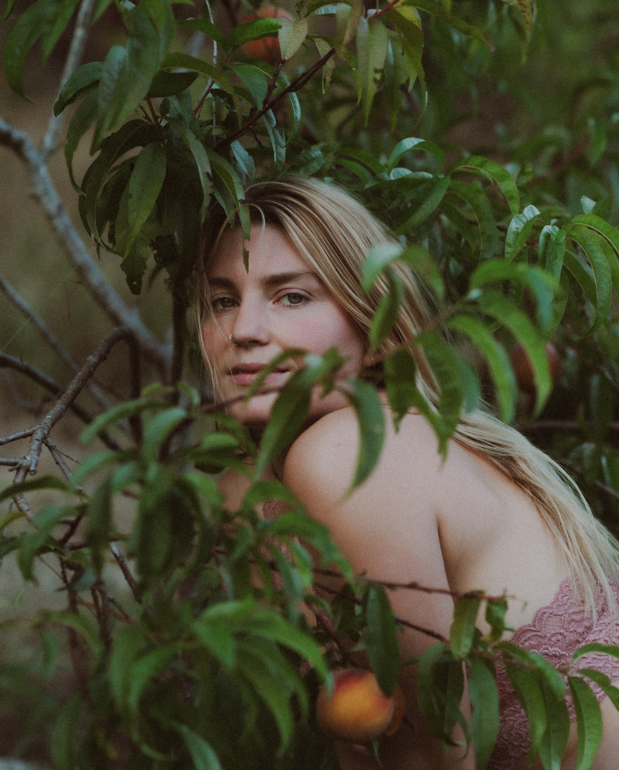 Loumicha Lapointe in the peach tree